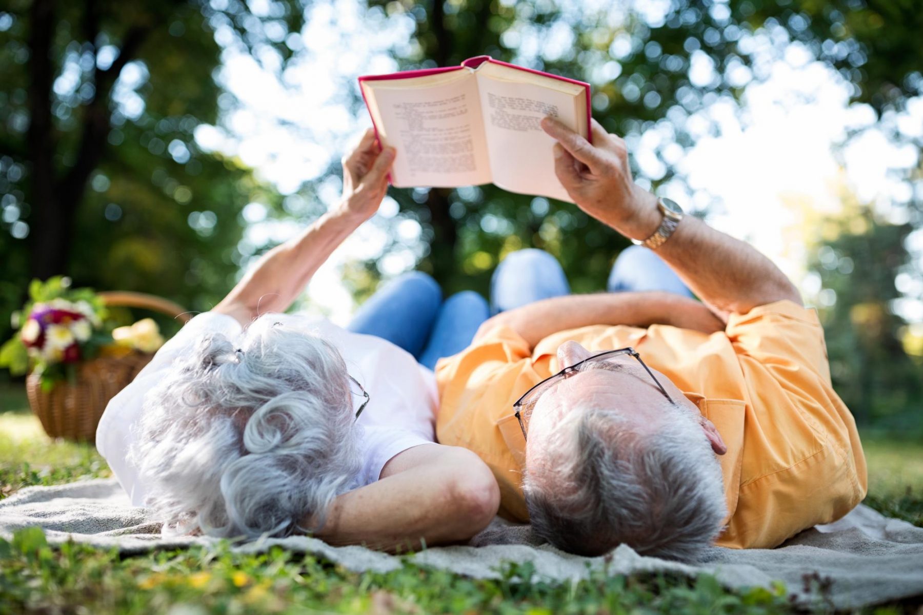 Couple sharing summer reading