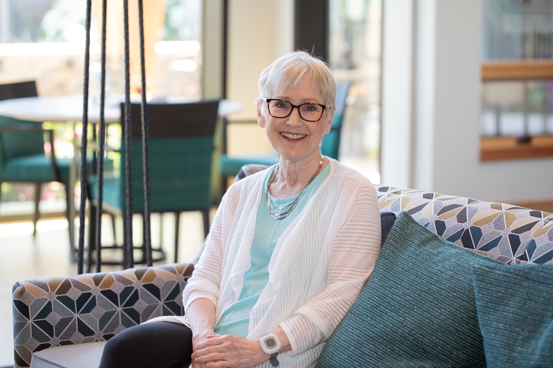 Woman sitting on couch